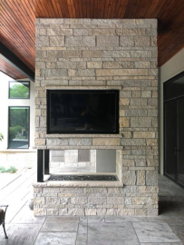 outdoor masonry fireplace